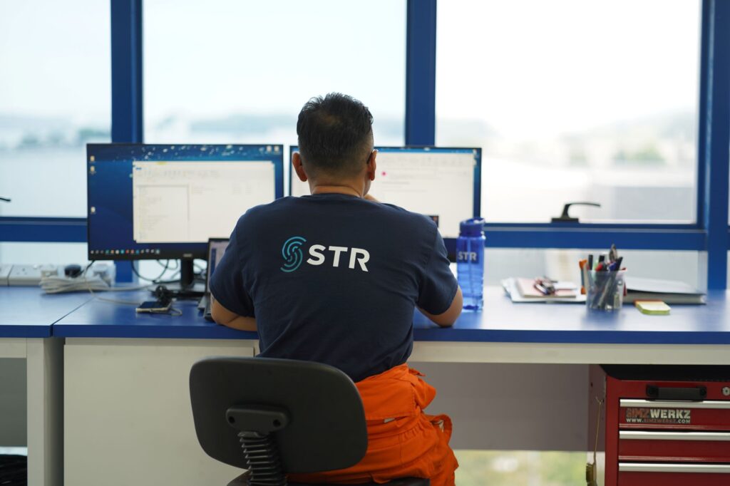 engineer man sat at desk